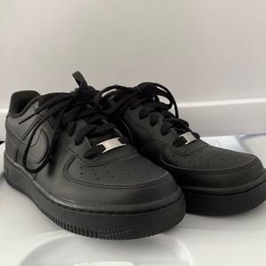 All black Nike Air Force size 5.5 youth / 7.5 women’s